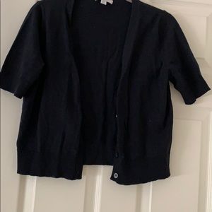 Black shrug